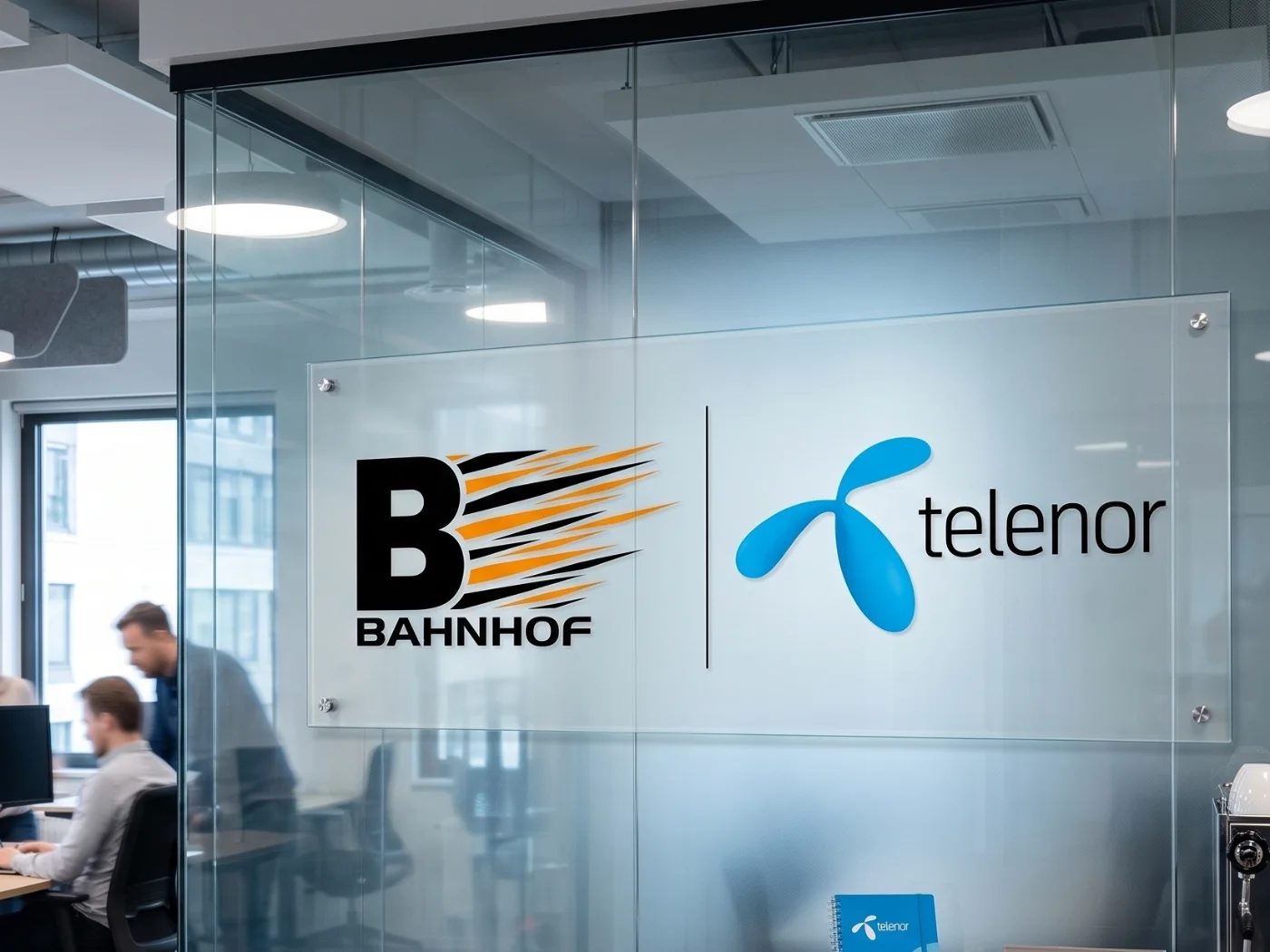 Telenor och Bahnhofs loggor i ett kontorslandskap